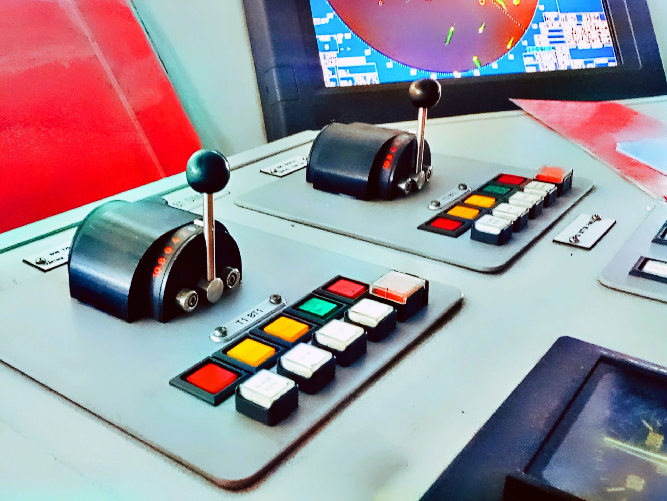 Ship bridge control console, representing operational control and safety